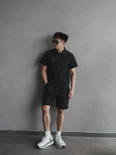 Load image into Gallery viewer, MEN’S FLOW POLO TEE - BLACK
