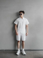 Load image into Gallery viewer, MEN’S FLOW POLO TEE - WHITE
